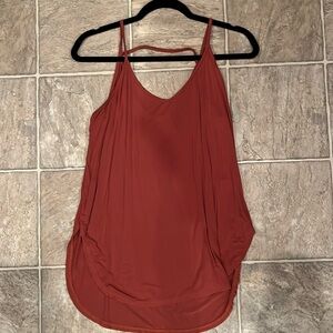 Orange/red tank top. Size Medium.